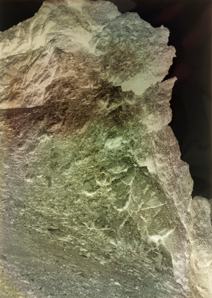 Negative image of Jan Mayen, showing coloured chemical swirls